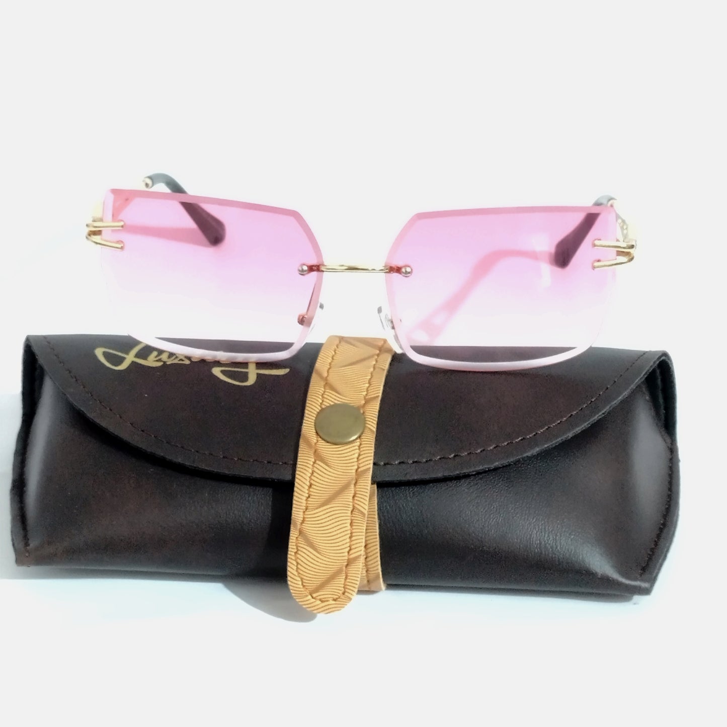 Enchant in Rose Gold Pink: Chic Rimless Sunglasses with a Modern Twist