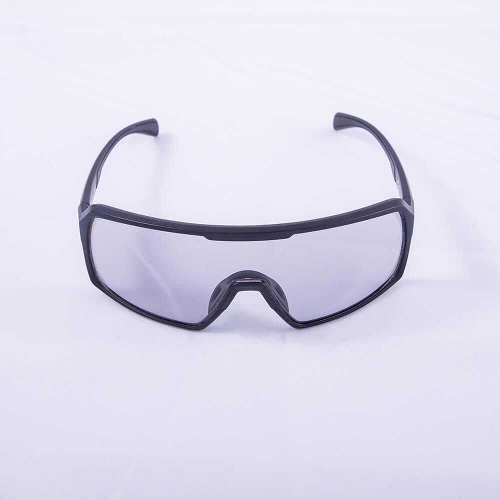 Black safety goggles on a white background
