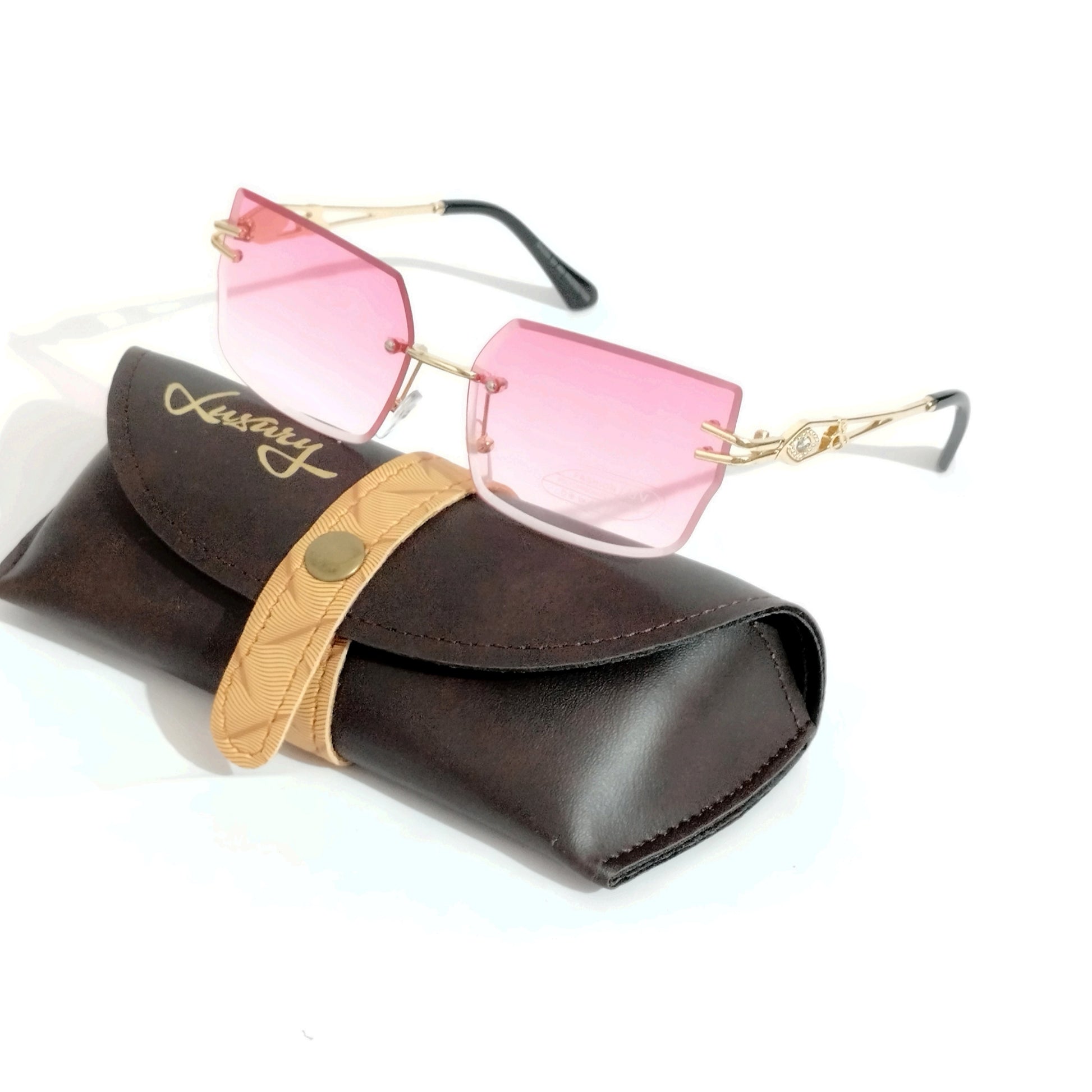 Enchant in Rose Gold Pink: Chic Rimless Sunglasses with a Modern