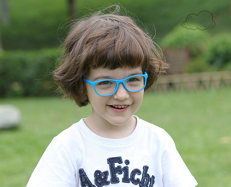 Child wearing blue S303 flexible rectangle kids glasses outdoors
