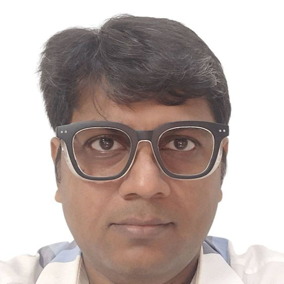 Person Wearing Moisture Chamber Glasses for Dry Eyes